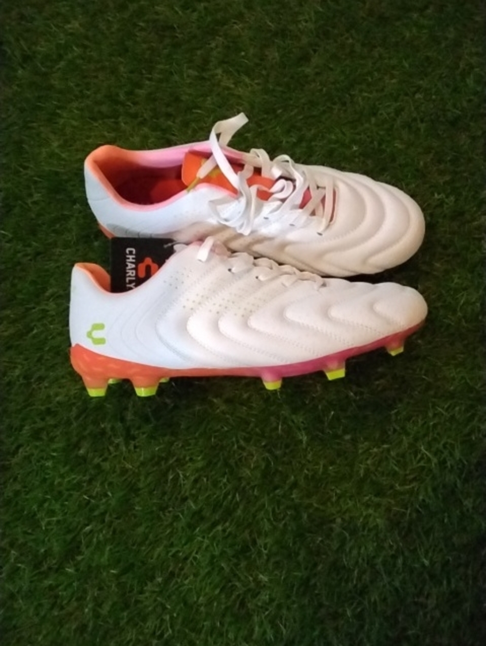 Charly Men’s White Athletic Soccer Cleats with Orange and Neon Accents